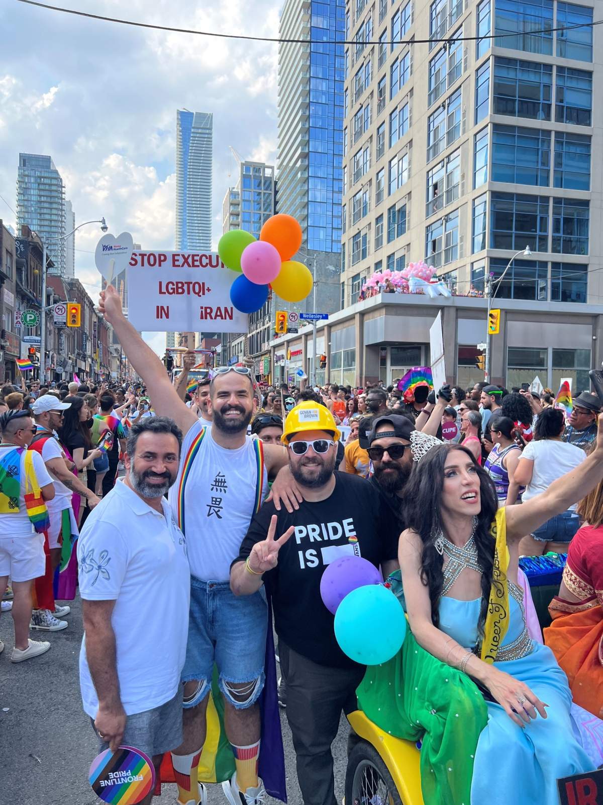 Arsham Parsi marching in the Toronto Pride Parade.