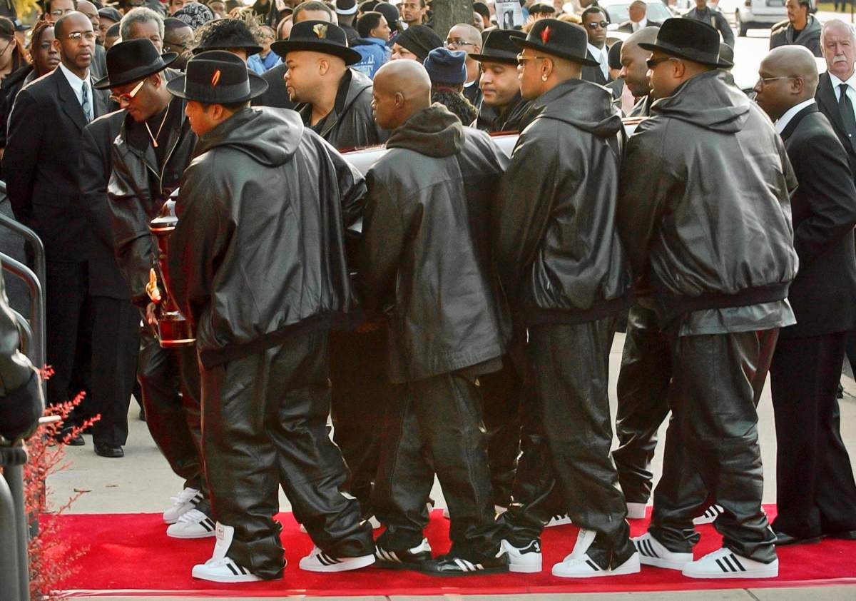This photo Nov. 5, 2002 file photo shows pallbearers carrying the casket of Run-D.M.C.’s Jason Mizell, known as Jam Master Jay, into Allen A.M.E. Cathedral for his funeral. (AP Photo/Kathy Willens, File)