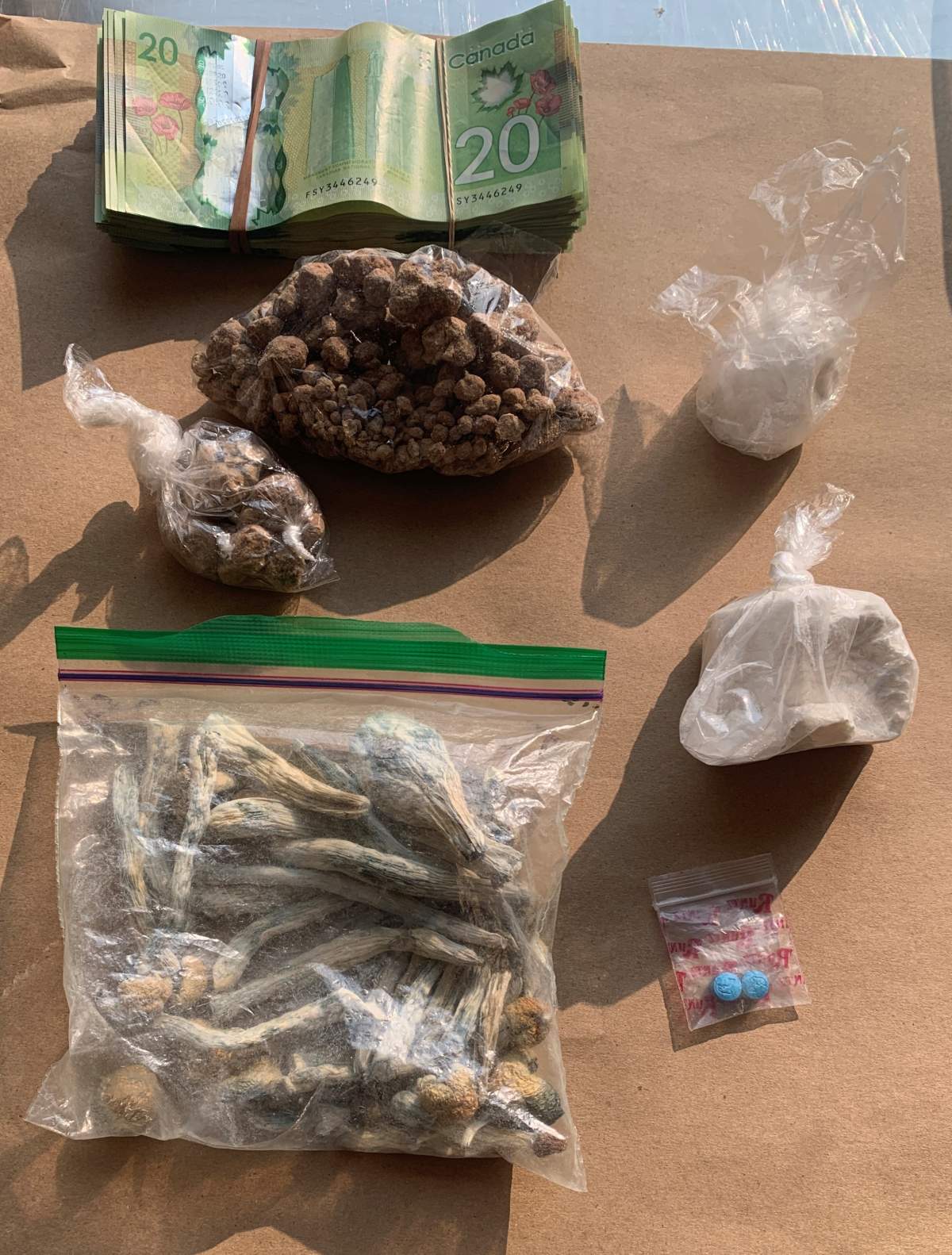 Some of the illicit drugs seized, including fentanyl and cocaine, as part of an EPS drug-trafficking investigation that culminated with arrests on Wednesday, Aug. 16, 2023.