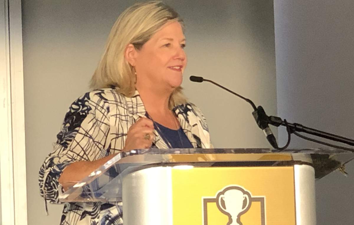Photo of Mayor Andrea Horwath speaking to a crowd at the Art Gallery of Hamilton prior to the 110th Grey Cup on August 15, 2023.