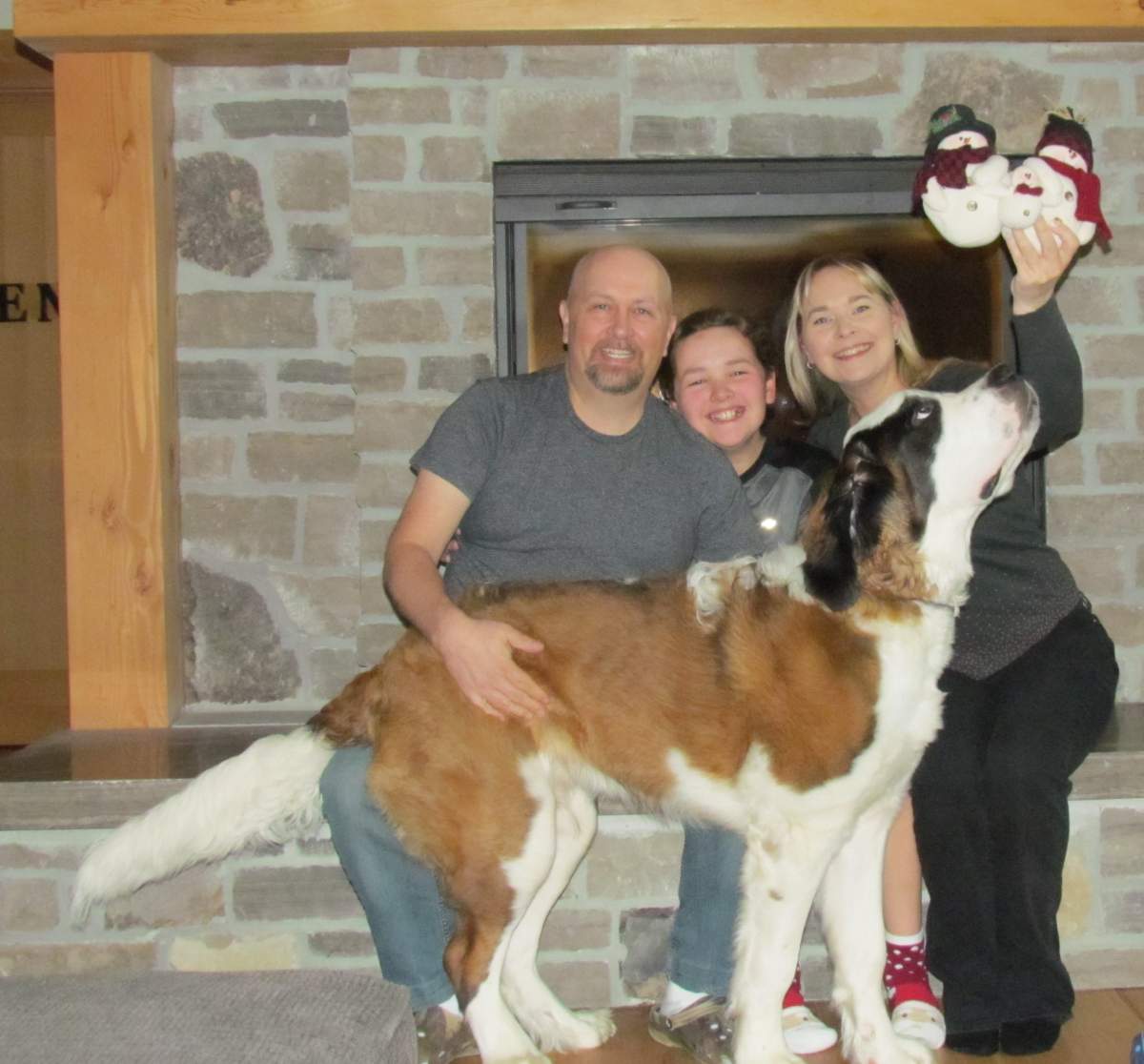 Janine Rankin-Abbott with son Owen Abbott (middle) and husband Rob Abbott (left).