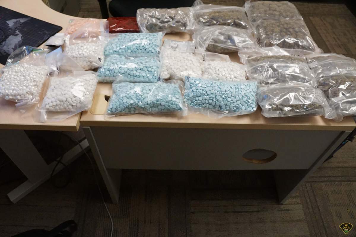 A table with bags filled with what police allege are drugs.