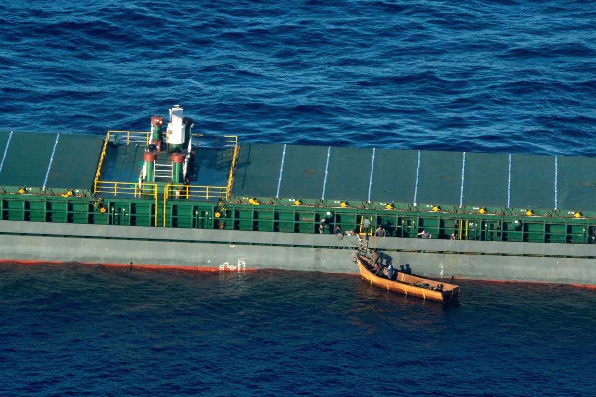 Four migrant survivors board a commercial tanker, the Maltese-flagged Rimona, Tuesday, Aug. 8, 2023.