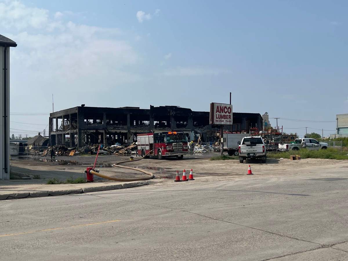 A massive fire in a commercial building prompted the evacuation of several homes and closed down a section of Logan Avenue in Winnipeg on Sunday.