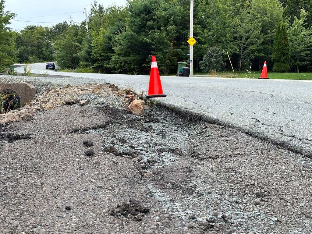 Many road shoulders have yet to be repaired weeks after the devastating Nova Scotia flash floods.