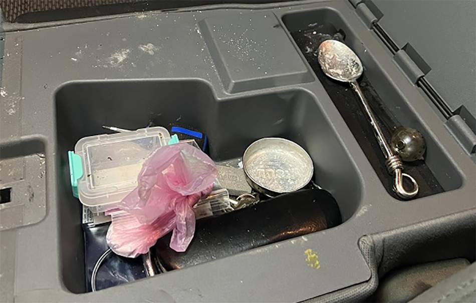 Manitoba RCMP found drugs and other contraband after investigating a suspicious vehicle and arresting its driver.