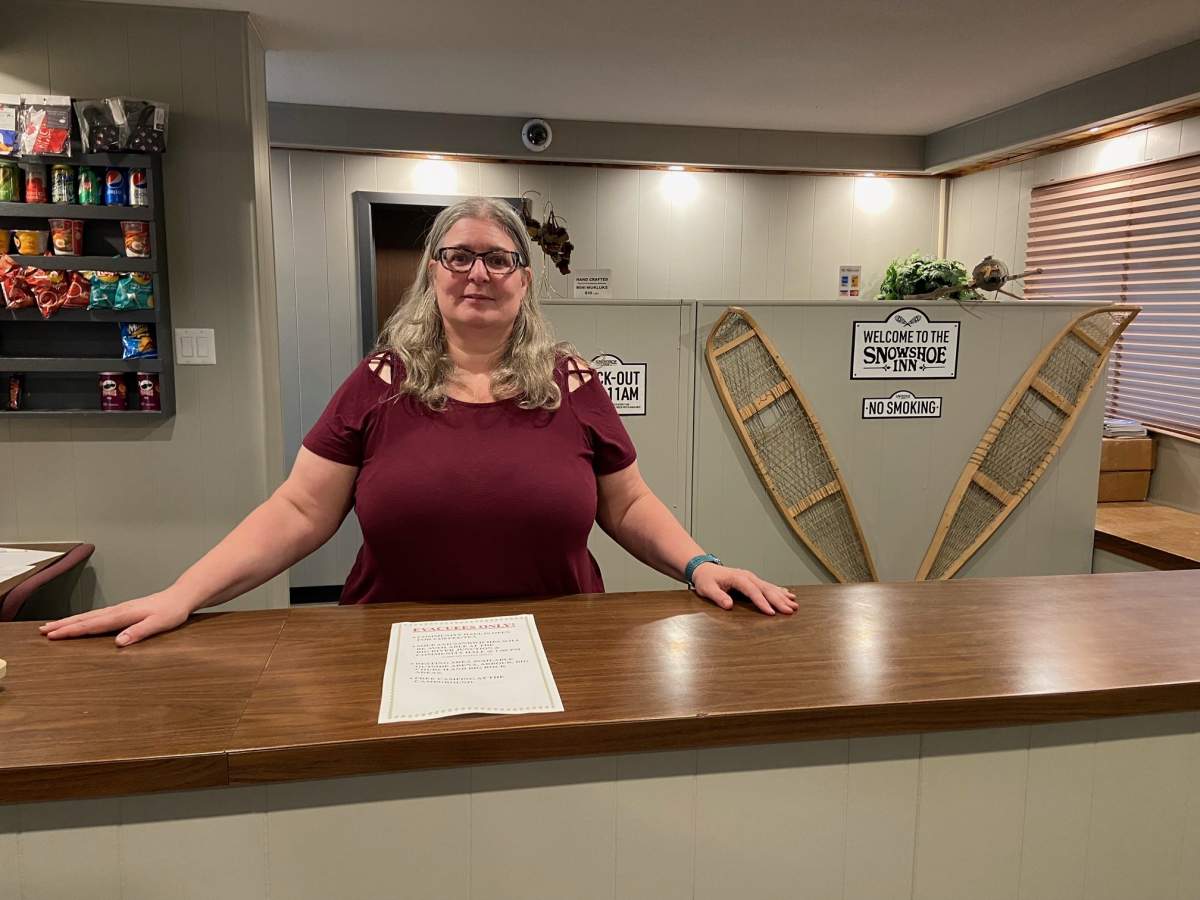 Cathie Clark says the Snowshoe Inn has 33 rooms, yet it housed nearly 150 people Wednesday night – filling its conference room with cots.