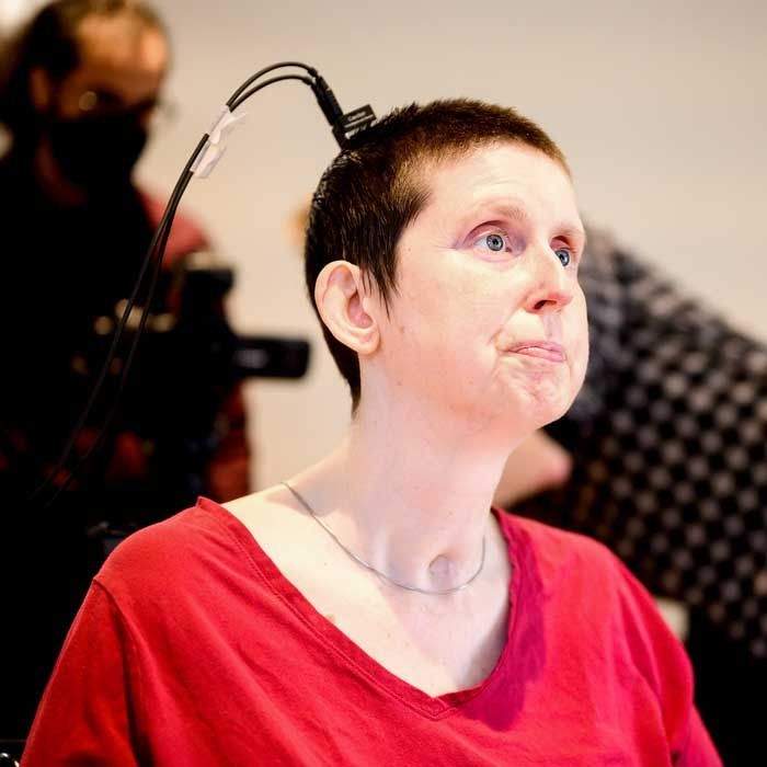 Ann Johnson working with researchers on a technology that allows her to speak via brain signals after a stroke left her paralyzed.