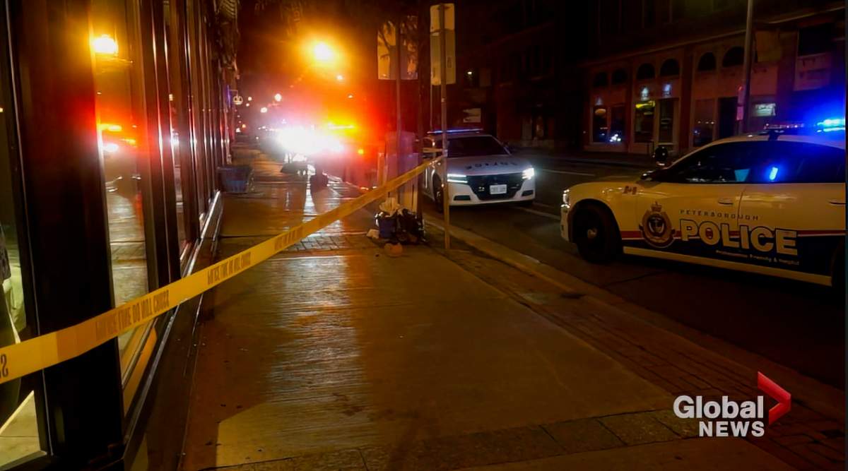 Police closed off a section of sidewalk following a reported stabbing on George Street in downtown Peterborough on Aug. 8, 2023.