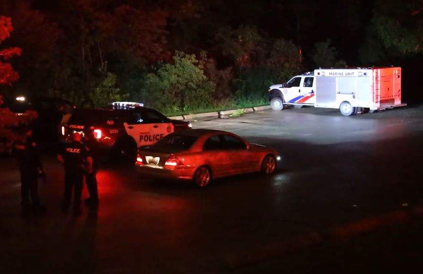 Crews searching for a missing person in Toronto on Aug. 25, 2023.