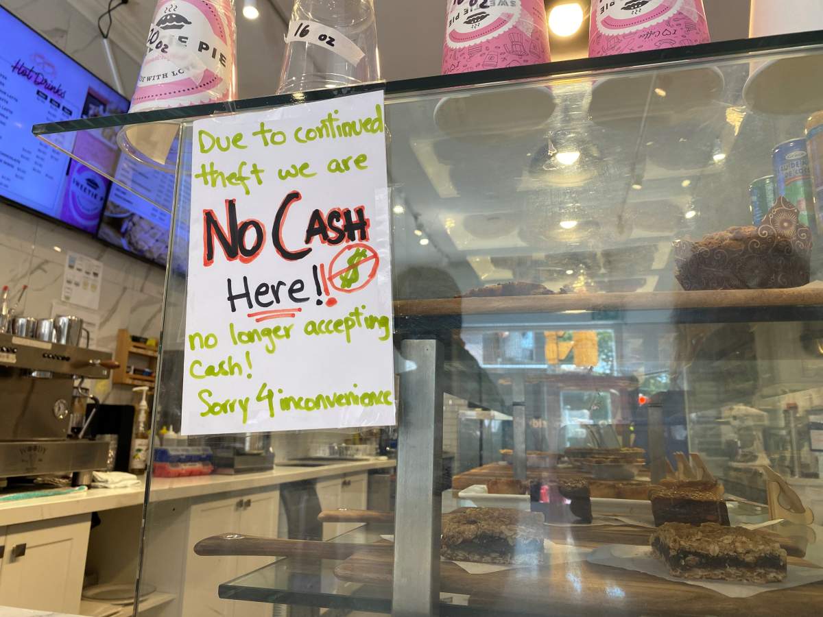 A sign posted in Sweetie Pie.