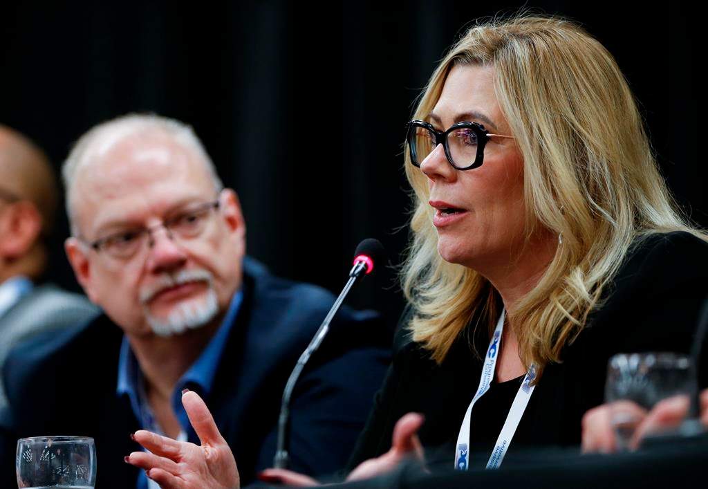 Manitoba MLA Rochelle Squires speaks at a Ministerial Bear Pit Session at the convention centre in Winnipeg on April 15, 2023. She said on Monday that the Progressive Conservatives would spend $120 million to address healthcare shortages in Manitoba if re-elected on Oct. 3. THE CANADIAN PRESS/John Woods.