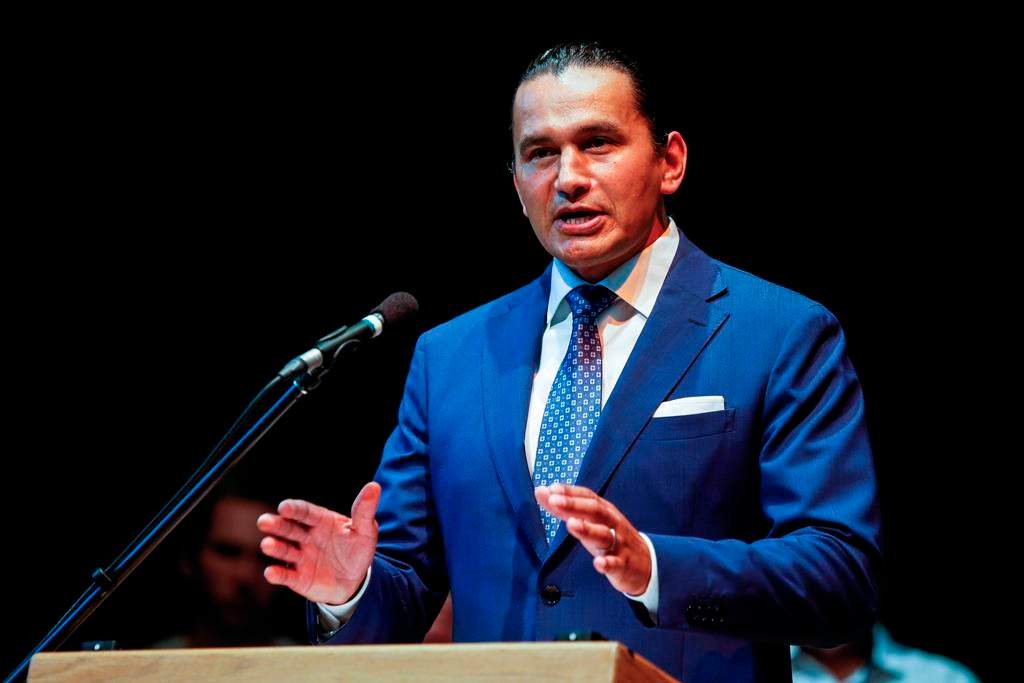 Manitoba NDP Leader Wab Kinew speaks during an event at the Canadian Mennonite University in Winnipeg on Aug. 16.