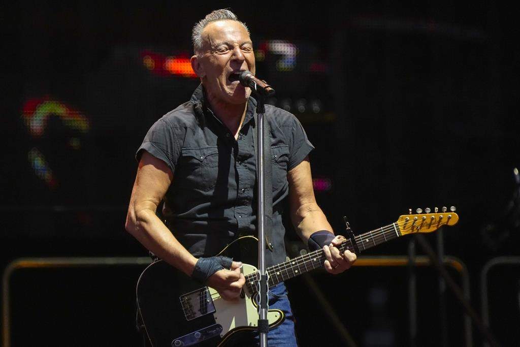 FILE - Bruce Springsteen and the E Street Band perform on Wednesday, Aug. 9, 2023, at Wrigley Field in Chicago. Springsteen announced that he's postponing a series of concerts on the advice of doctors treating him for peptic ulcer disease.