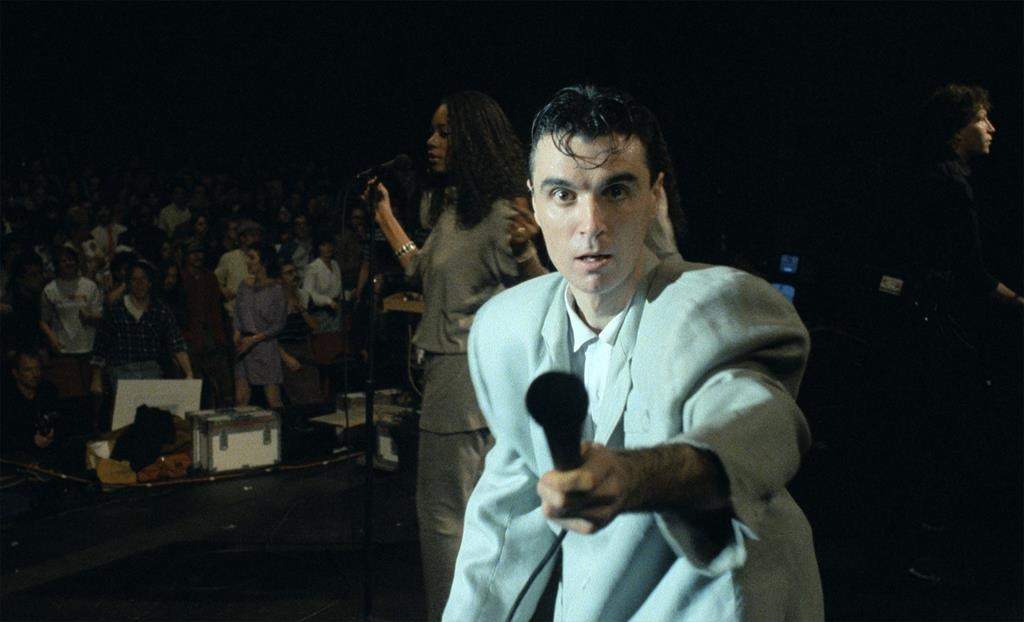 This image released by A24 shows David Byrne in a scene from "Stop Making Sense." (Jordan Cronenweth/A24 via AP).
