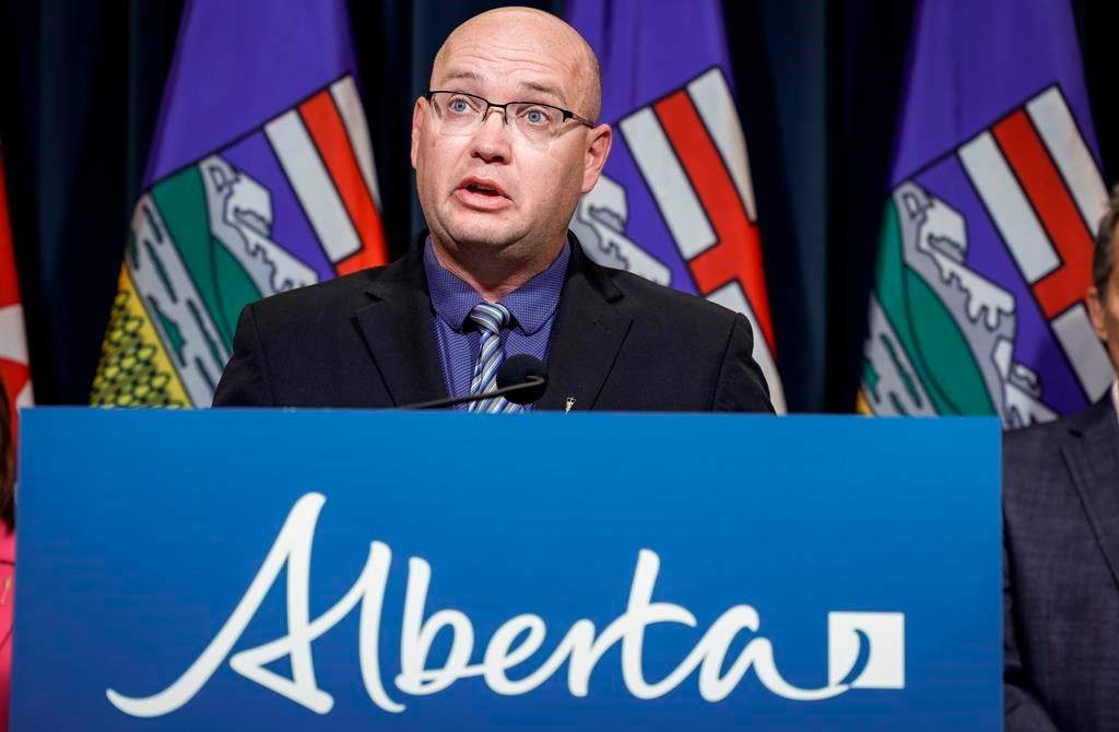 Alberta Minister of Children and Family Services Searle Turton speaks to the media about an E. coli outbreak linked to multiple Calgary daycares surpassing 200 cases, in Calgary, Tuesday, Sept. 12, 2023. The Alberta government appears to have extended a one-time payment of $2,000 for each child affected by an E. coli outbreak in Calgary to 19 daycares.