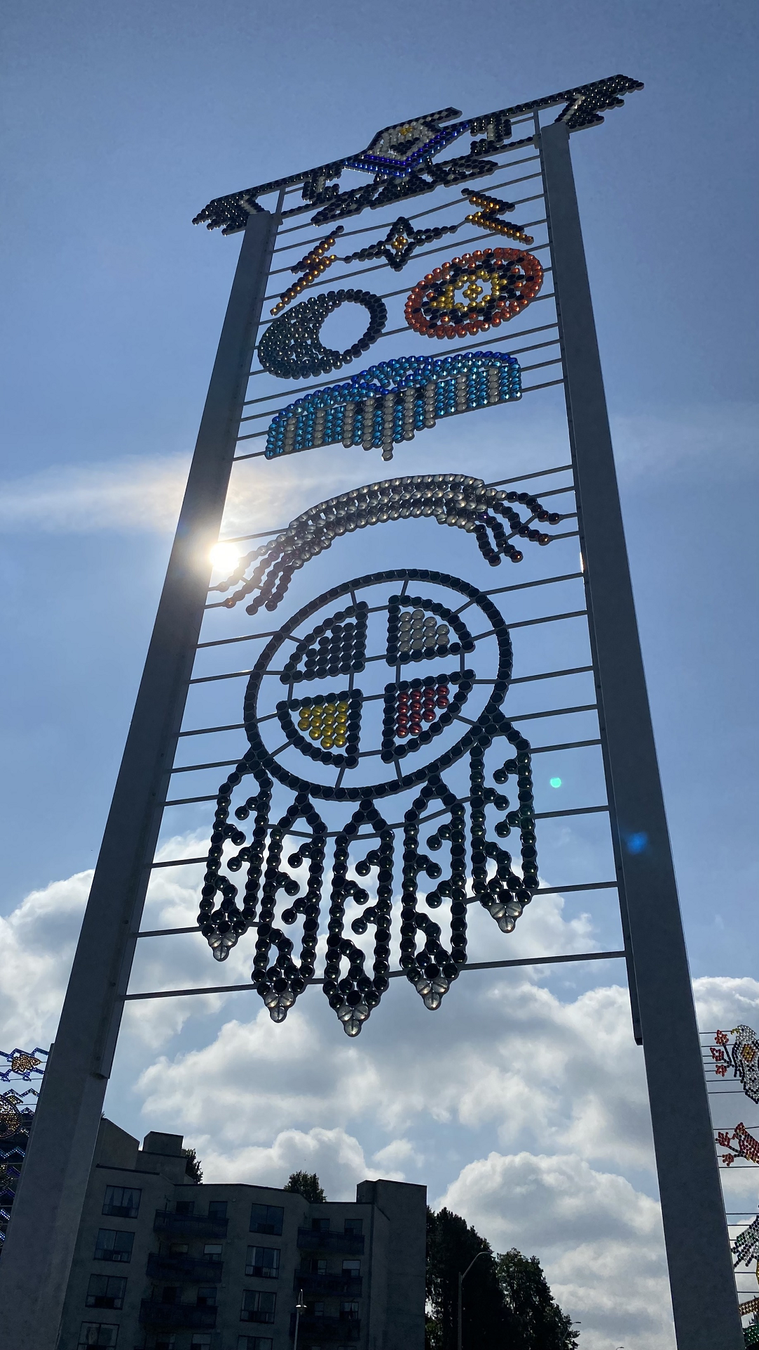 A 40-foot tall panel with glass beads as part of an art installation on Hamilton's waterfront that has been designed by a local Indigenous artist.