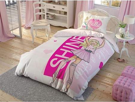 Barbie themed bedding invluding sheets, pillow cases and comforter with a big barbie doing ballet with the word Shine beside her