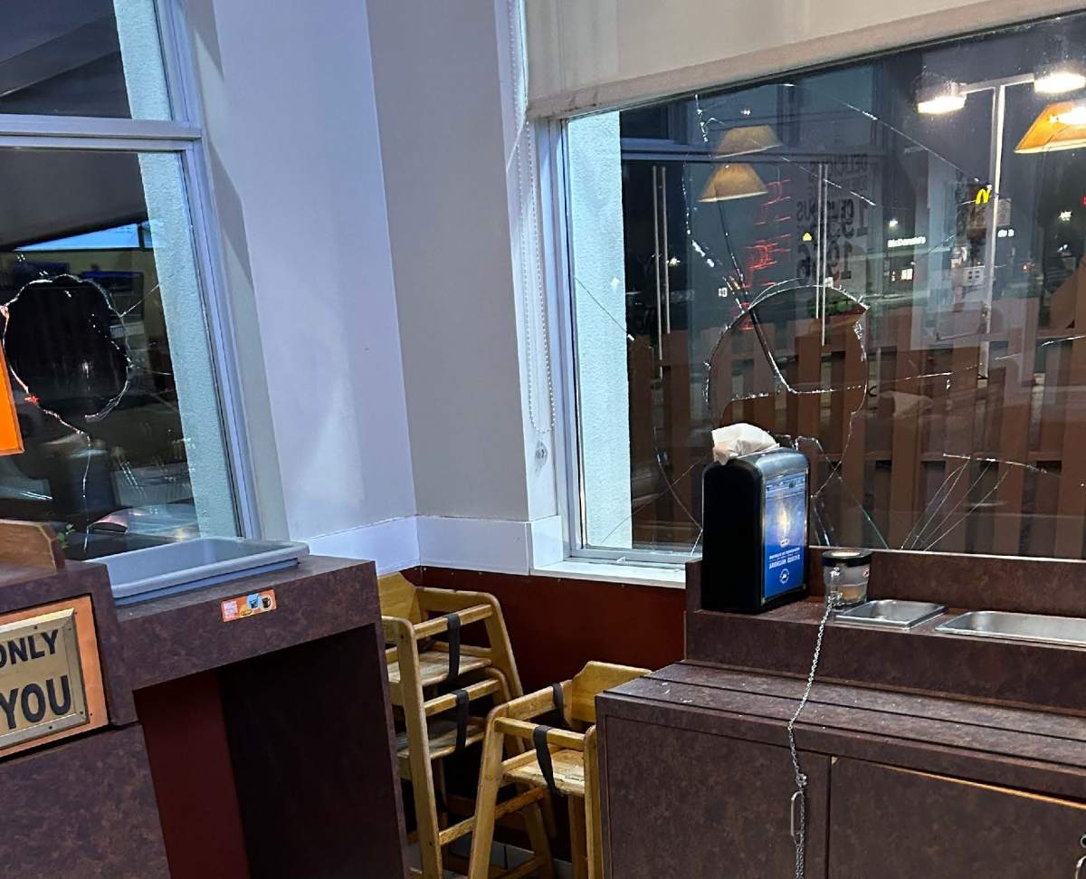 The windows of a business in Swan River were damaged after RCMP officers say a man had broken into a residence and damaged property between Sept. 24 and 25.