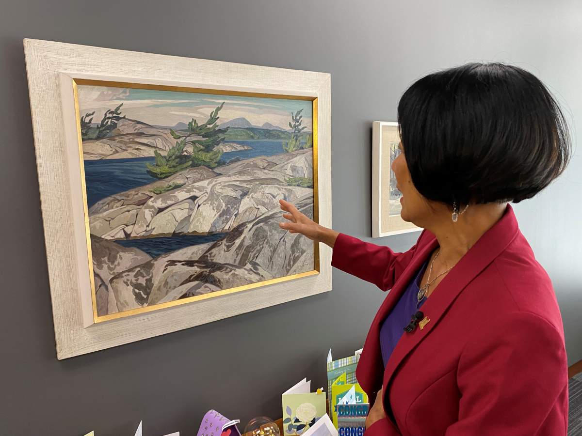 Mayor Olivia Chow admires a piece she selected by the Group of Seven’s A.J. Casson.