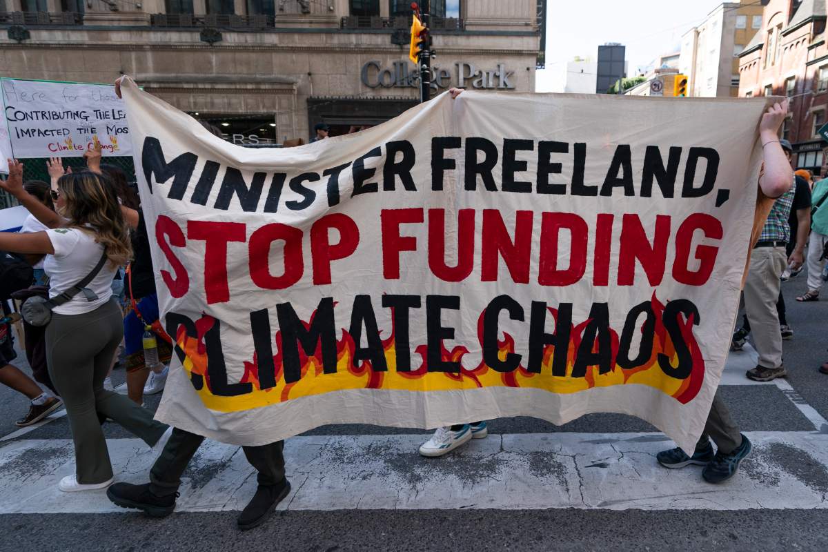People participate in a climate protest in Toronto, on Saturday. THE CANADIAN PRESS/Spencer Colby