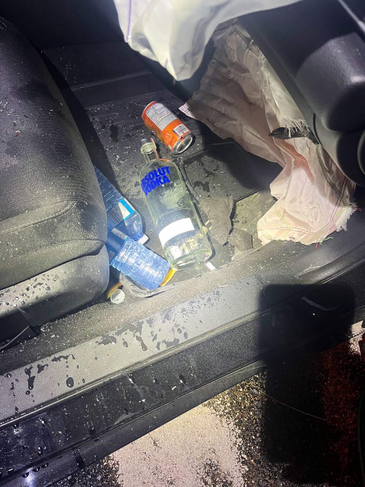 Alcohol bottles inside the alleged impaired driver’s vehicle.
