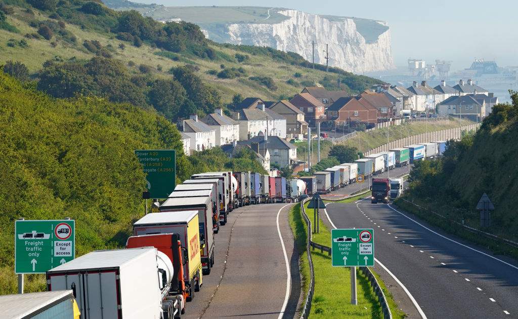 Trucks queue for the Port of Dover along the A20 in Kent as security checks are being carried out amid an ongoing effort to track down an escaped terrorism suspect, Daniel Abed Khalife.