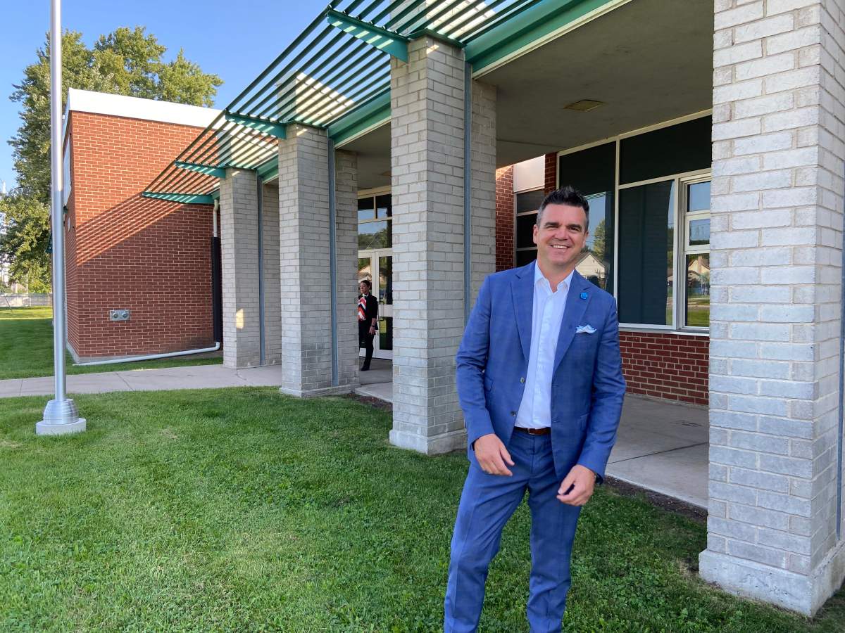 Mark Fisher, TVDSB director of education, stands outside the newly renamed Forest City Public School in London, Ont.