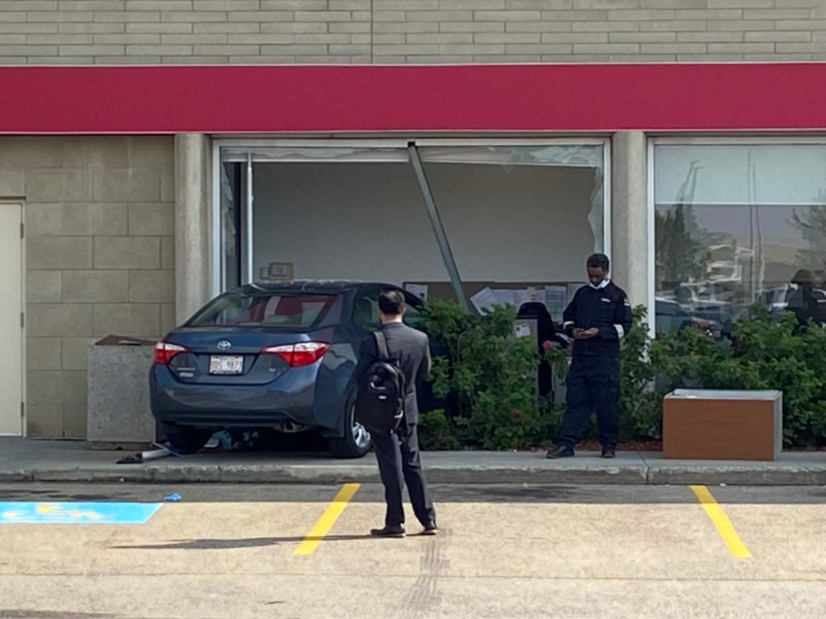 Car collides with CIBC bank in south Edmonton on Gateway Blvd. just south of Whitemud Drive, on Sept. 6, 2023.