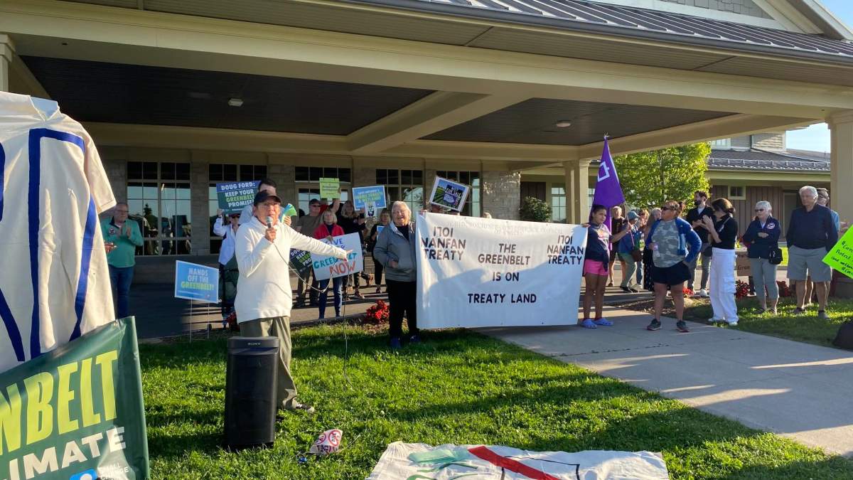 A photo of demonstrators out front of Marritt Hall on Sept. 14, 2023 prior to a City of Hamilton committee meeting on site at the Ancaster Fairgrounds.