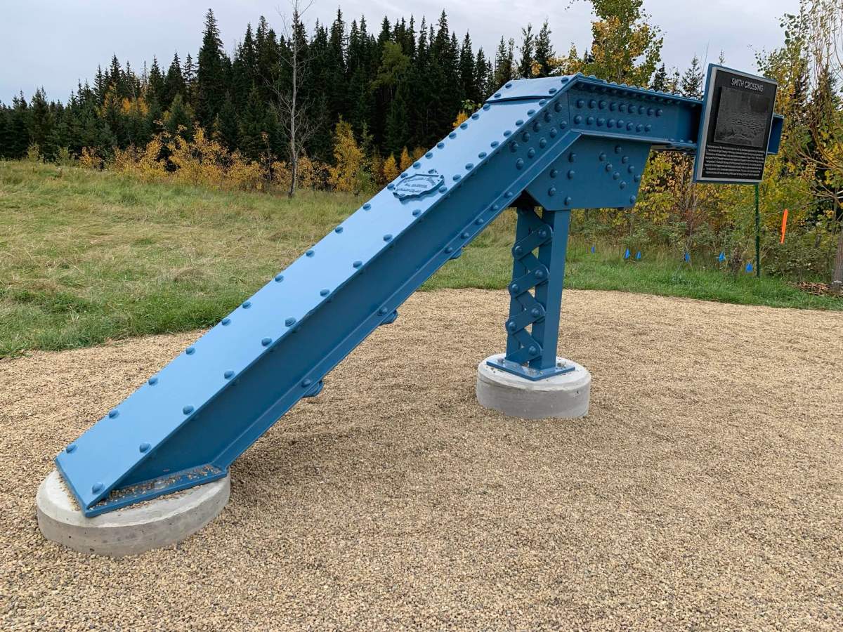 Part of the original Smith Crossing Bridge was preserved and is now part of a commemorative plaque.