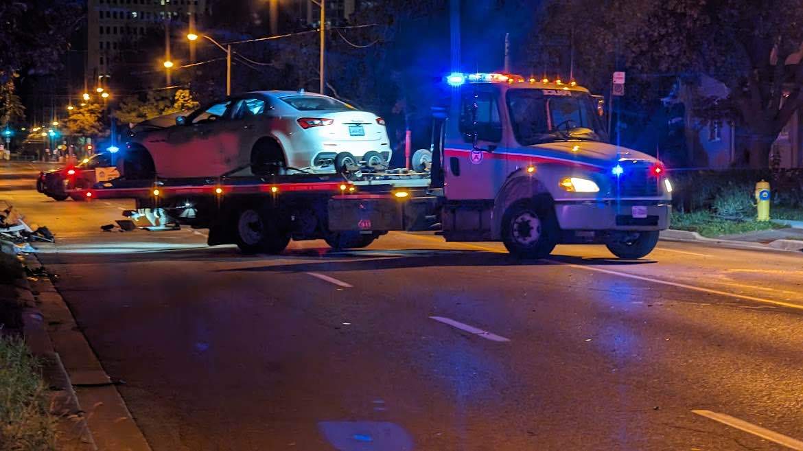 One vehicle is towed after a multi-vehicle crash in Toronto on Sept. 14, 2023.