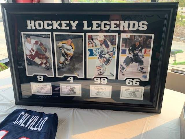Signed NHL jerseys being raffled off as part of fundraiser for Ryland Nobal, Stollery, and Little Warriors at Nitza's Pizzas in Sherwood Park on Sept. 4, 2023.