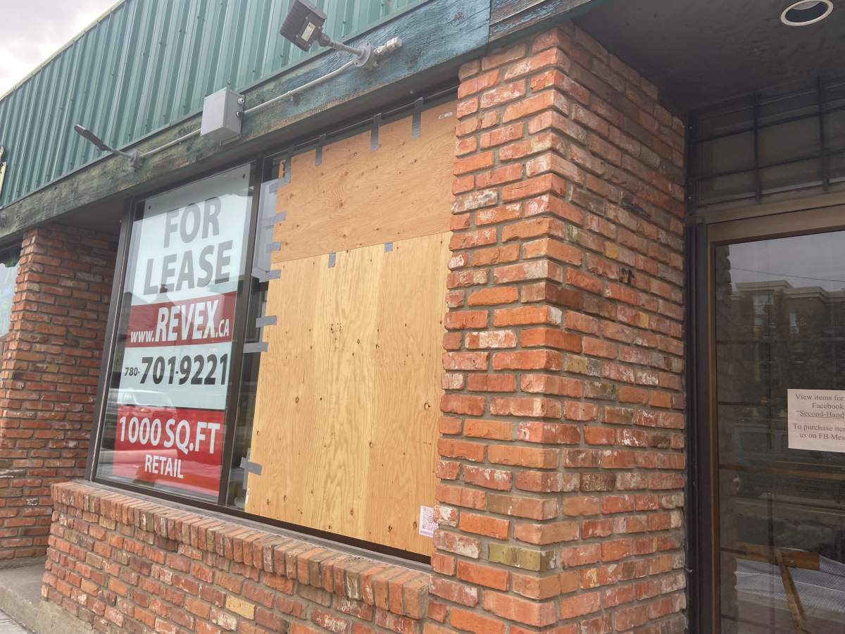 A boarded-up window is seen in Edmonton's Old Strathcona neighbourhood on Sept. 26, 2023.