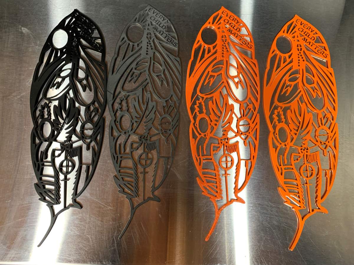 Orange feather pins project kicks off in Regina with Orange Shirt Day coming up - image