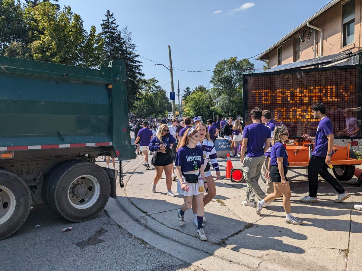 Thousands of students head onto Broughdale Avenue to take part in Homecoming weekend festivities.