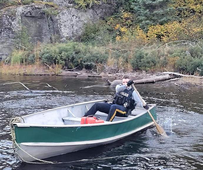RCMP said difficult terrain meant officers needed to use both an ATV as well as a boat to reach the injured man. 