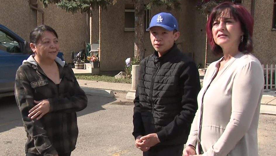 Lawyer Heather Steinke-Attia, Irene and Pacey Dumas in Edmonton, Alta. on Tuesday, September 12, 2023.
