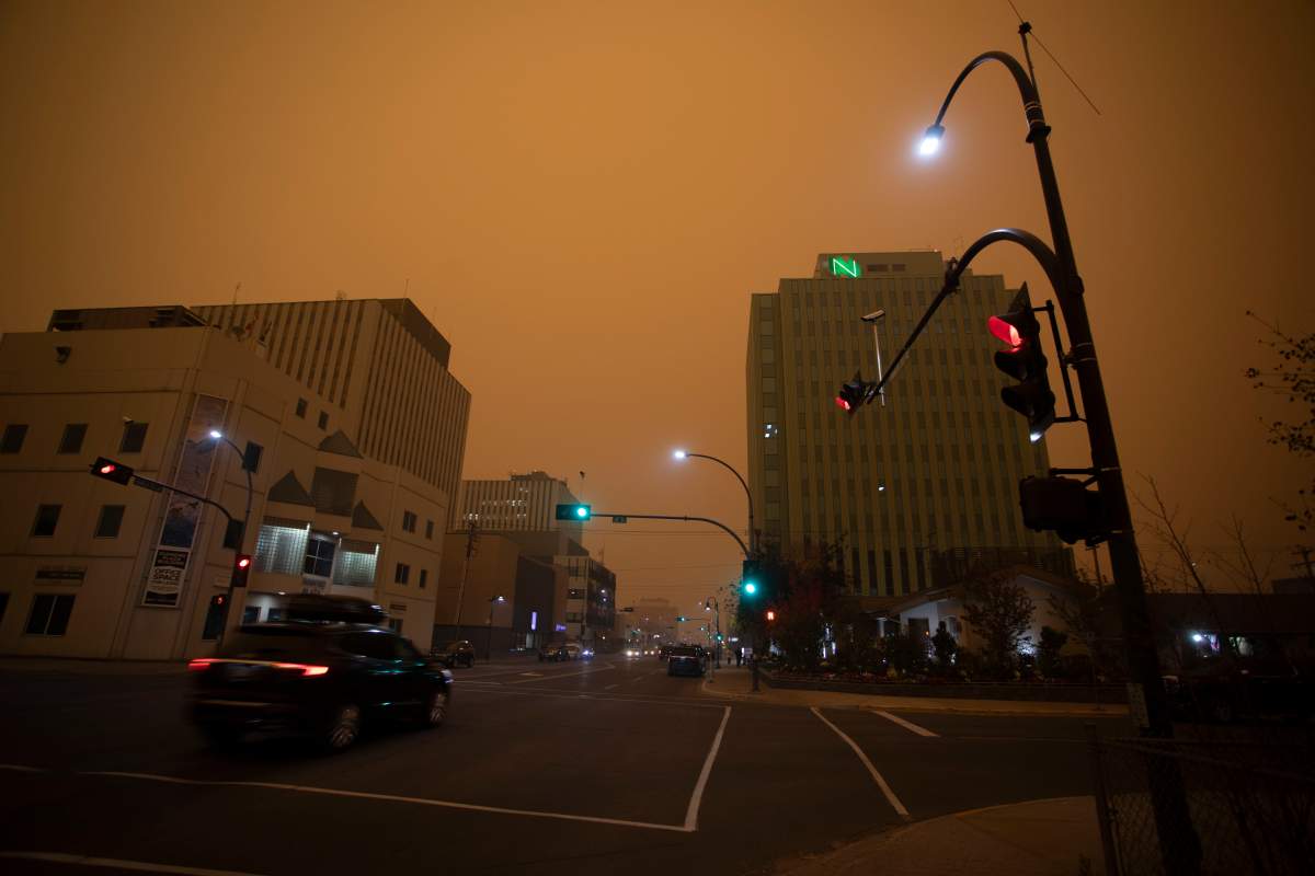 Heavy smoke from wildfires in northern Alberta and British Columbia fill the air at 9am Mountain Daylight Time in Yellowknife, Northwest Territories on Saturday, Sept. 23, 2023. THE CANADIAN PRESS/Bill Braden