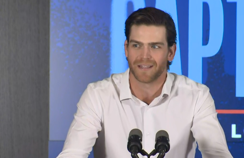 New Jets captain Adam Lowry speaks to media Tuesday.