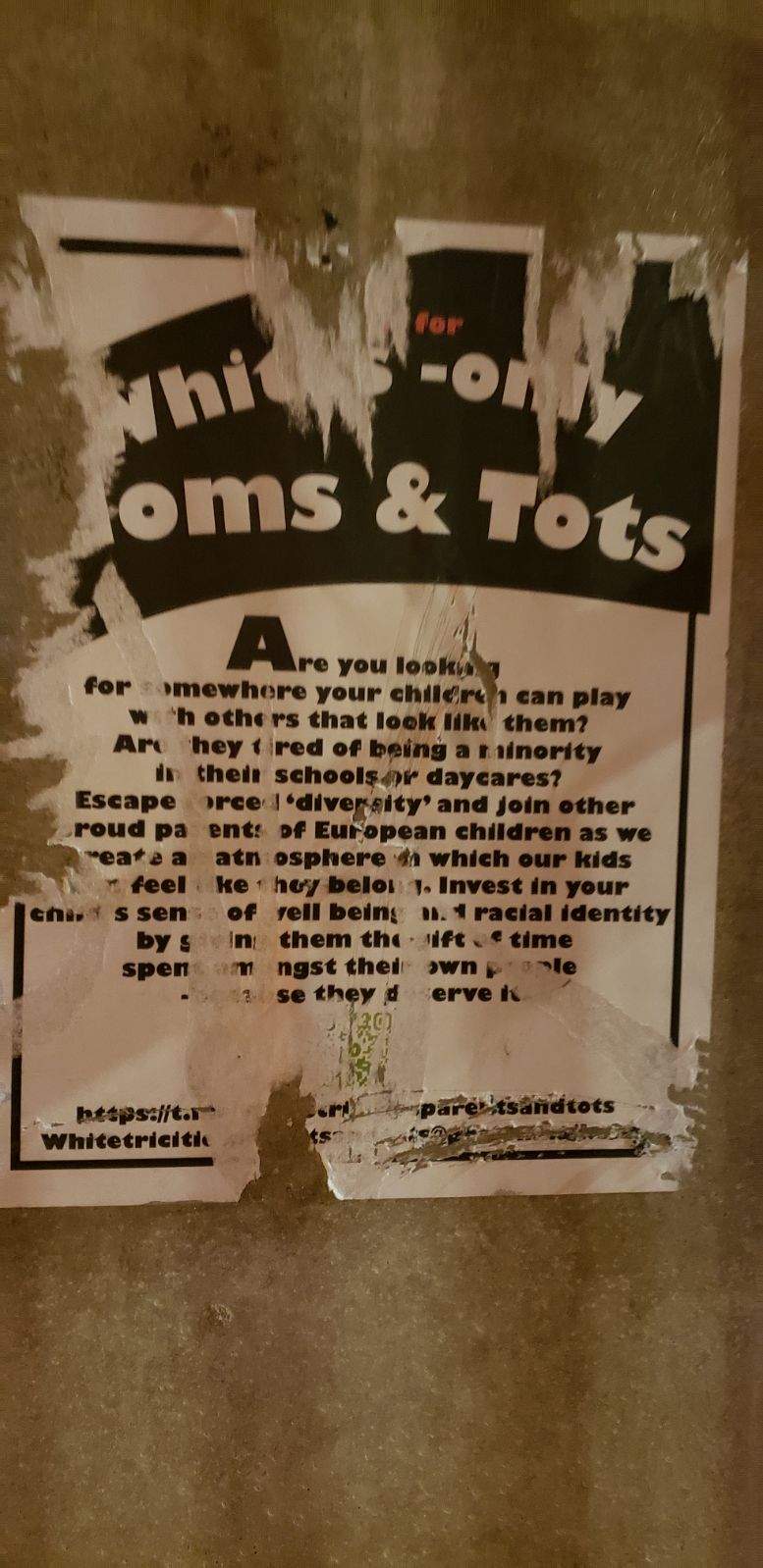 The poster, seen at a SkyTrain station in Coquitlam, had been partially ripped.