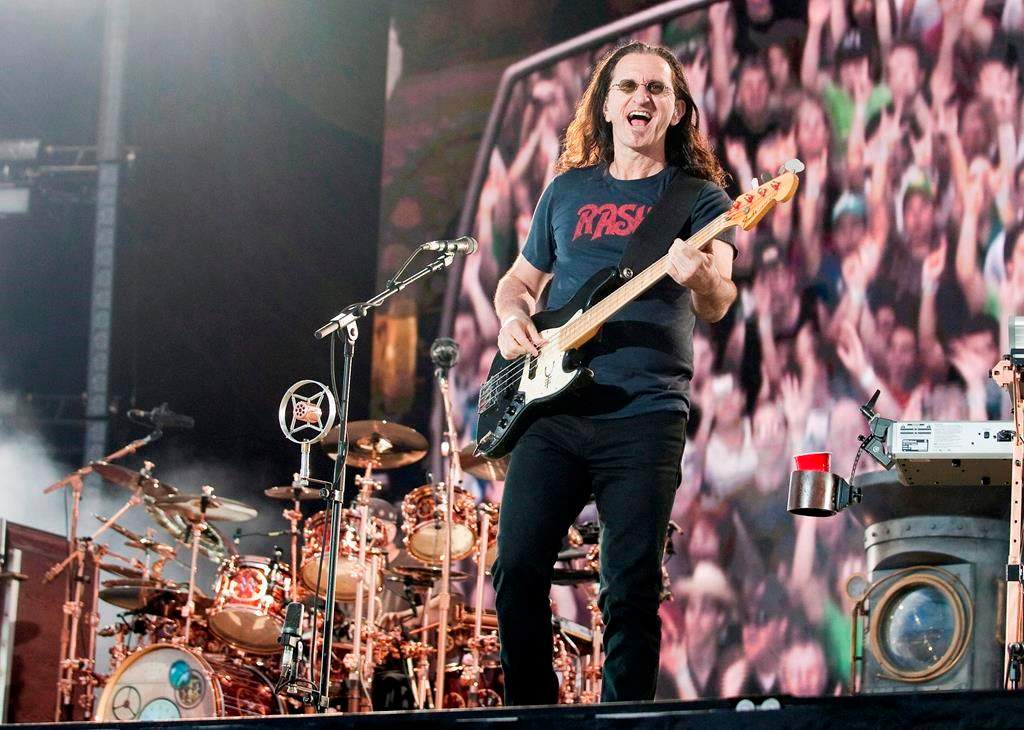 Rush vocalist and bassist Geddy Lee performs with Rush in front of a crowd of close to 100,000 fans on July 15, 2010, as part of the Quebec Summer Festival in Quebec City.
