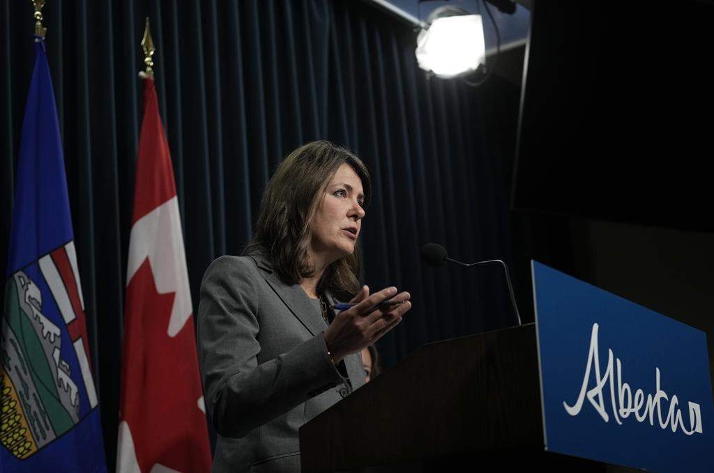 Alberta Premier Danielle Smith speaks during a news conference in Calgary on Friday, Oct. 13, 2023.