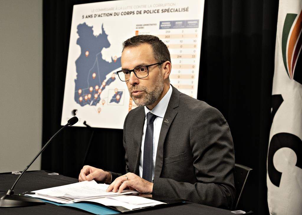 Quebec anti-corruption commissioner Frédérick Gaudreau unveils his annual report at a news conference, Tuesday, Oct. 24, 2023, in Quebec City. Quebec's anti-corruption force says that although the scandals that defined the province's construction industry in the last decade have subsided, corrupt activities have propagated on a smaller scale in several other sectors. 