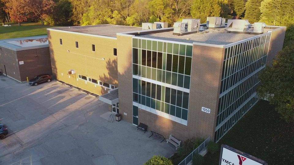 The organization faces financial struggles due to a decline in memberships, increased maintenance and utility costs for the aging facility, and overall infrastructure demands.