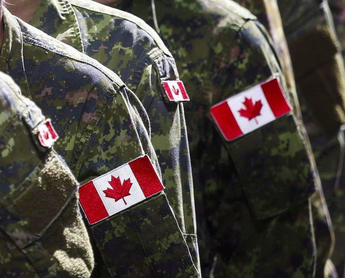 Members of the Canadian Armed Forces march in Calgary on July 8, 2016.