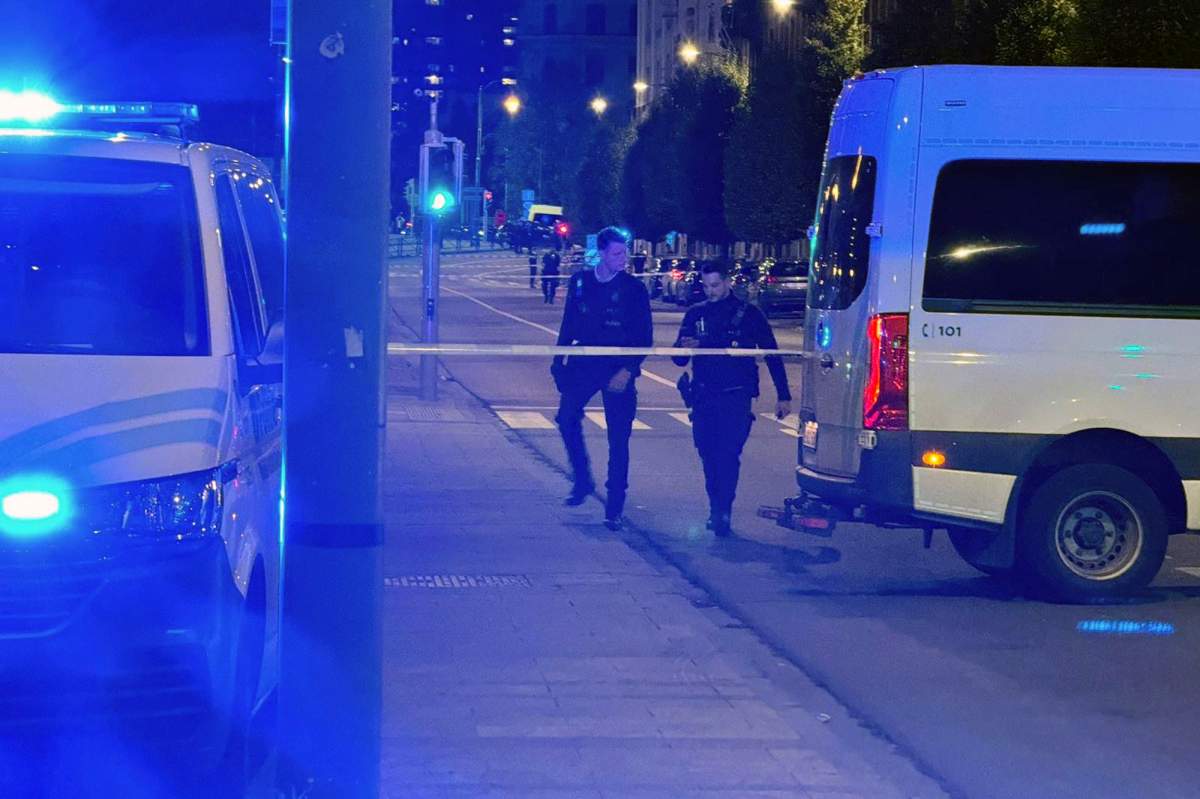 Police cordon off an area where a shooting took place in the center of Brussels, Monday, Oct. 16, 2023. Belgian police say that two people are dead in central Brussels after several shots were fired. (AP Photo/Sylvain Plazy).
