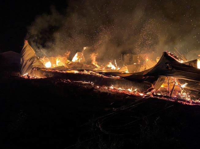 Manitoba RCMP are looking into the cause of this fire at a Gods Lake First Nation church last week.