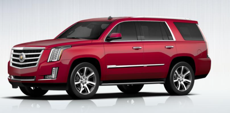 A stock photo of a red Cadillac Escalade.