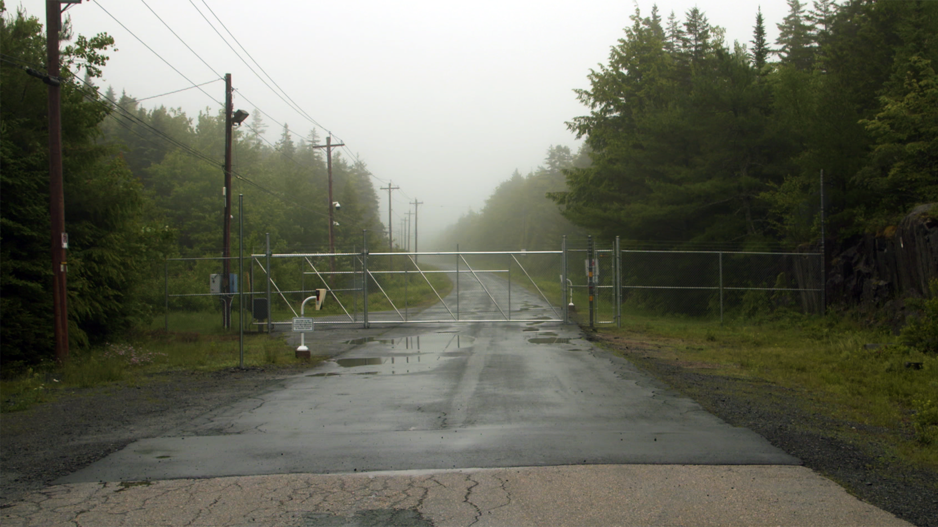 Metal gates surround the J.D. Kline Water Treatment Plant. The area has been closed to the public since the expropriation of the Pockwock Lake watershed in the mid-1970s.